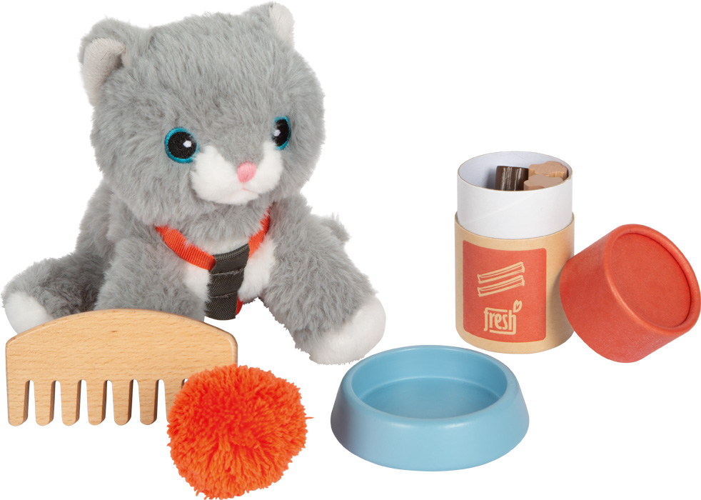 Katze mit Tasche und Pflege-Set