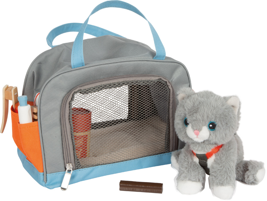 Katze mit Tasche und Pflege-Set